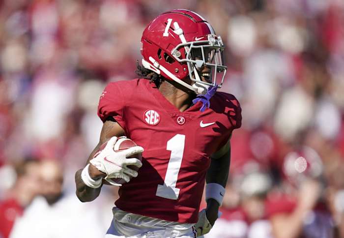 Alabama WR Jameson Williams runs after catch